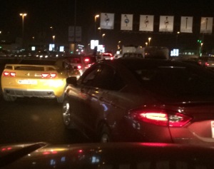 That Camaro was not happy when the guy in the rental rubbed his from right wheel well and quarter panel. Too may cars for one spot. Ho-hum another night in Mussafah.